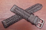 braided leather strap crossed