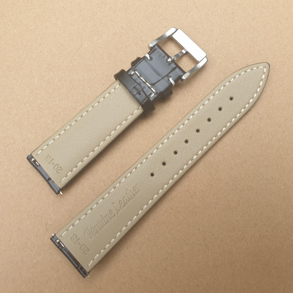 underside of alligator pattern watch strap showing quick release spring bars