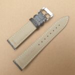 underside of alligator pattern watch strap showing quick release spring bars