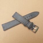 top grain leather watch strap showing both pieces in cross pattern