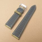 handmade leather watch strap underside showing vents designed for comfort on wrist