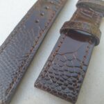 Ostrich Brown watch strap Up Close showing fight marks in skin