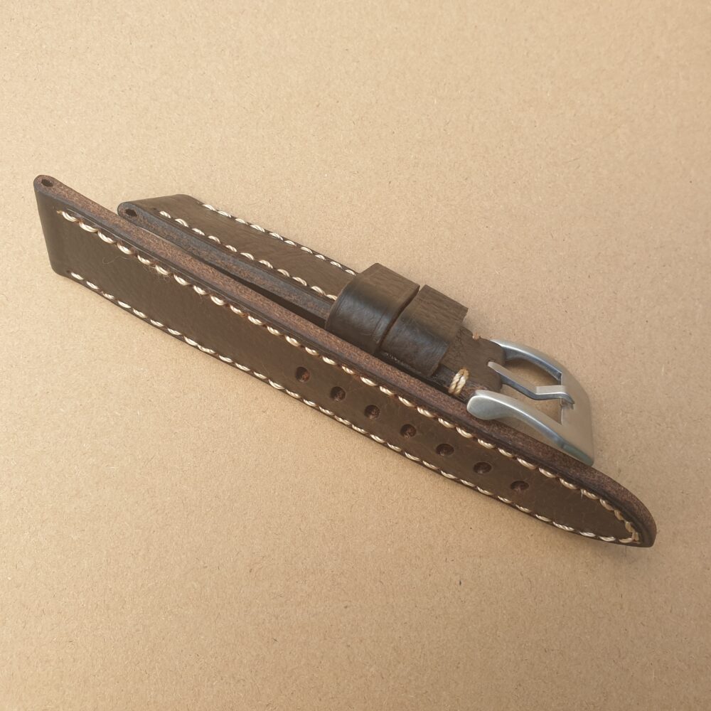 side view of leather watch strap unburnished edge