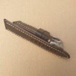 side view of leather watch strap unburnished edge