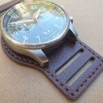 brown bund strap with Audi watch