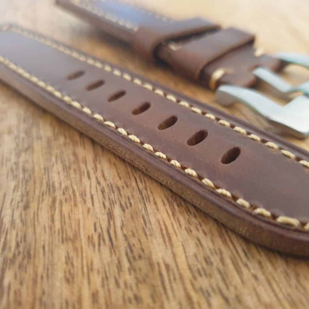 handmade leather watch strap with square edge stitching at lug