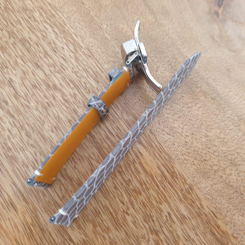 side of thin dress watch crocodile strap