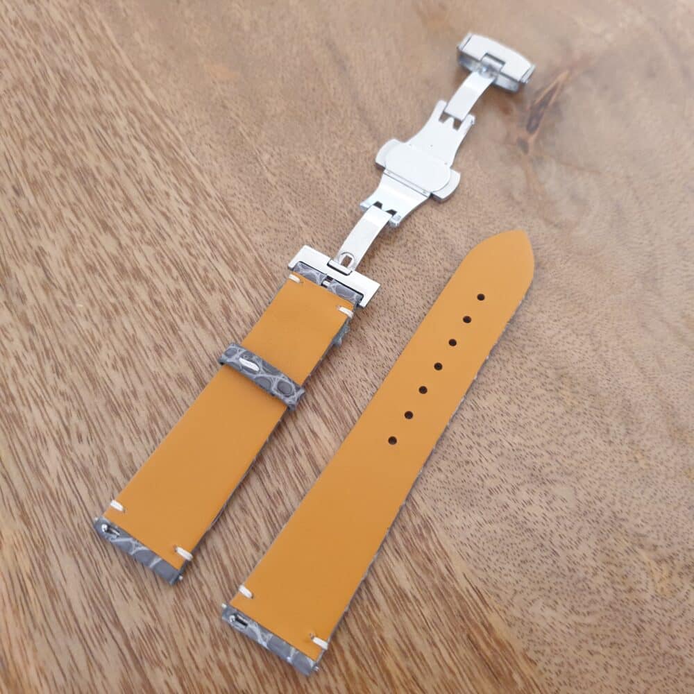 underside of grey crocodile watch band