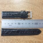 Crocodile leather watch strap 22mm showing length of each piece next to ruler for reference