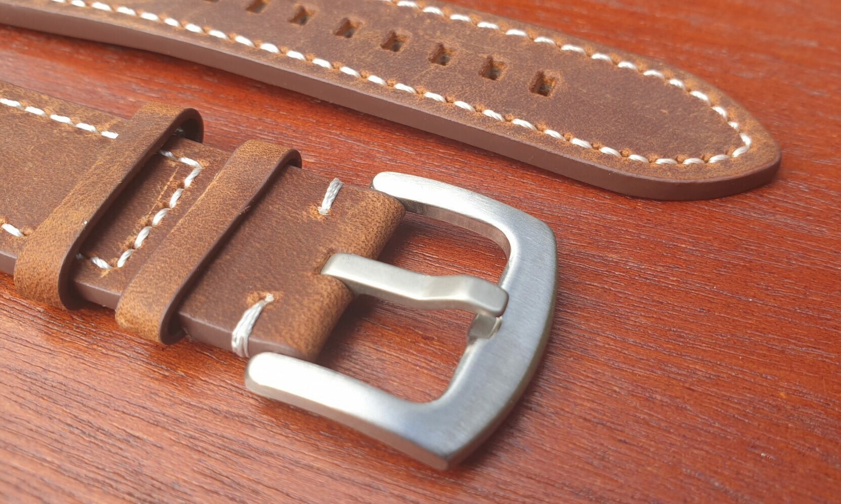 mapleton brown leather strap white stitching and silver buckle