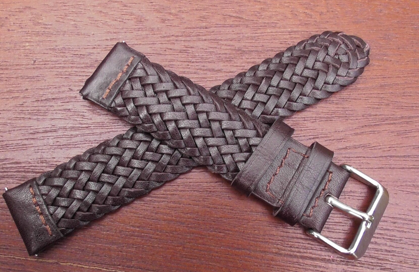 braided leather strap crossed