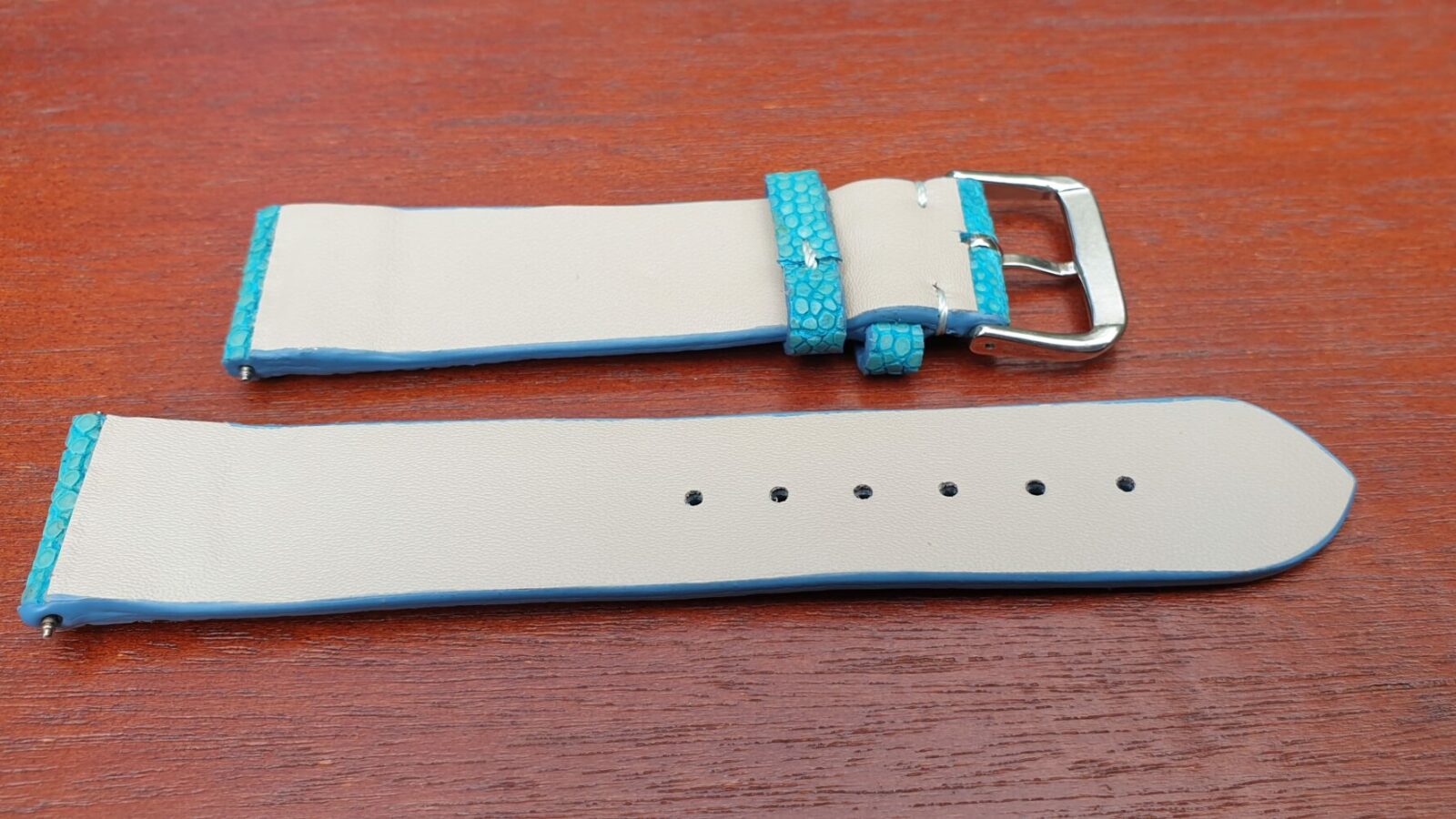rear of turquoise strap