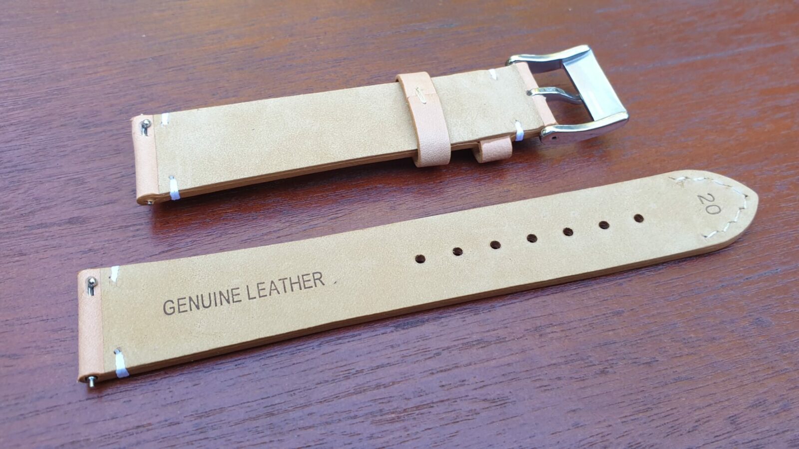 rear of leather watch strap showing quick release pins