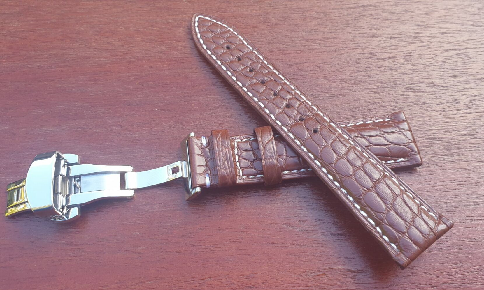 brown alligator leather watch strap with white stitching