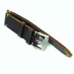 Side view of leather watch strap showing raw edges