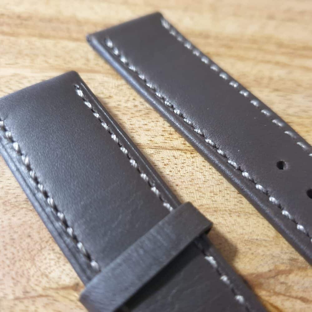 close up of leather watch strap edge stitching