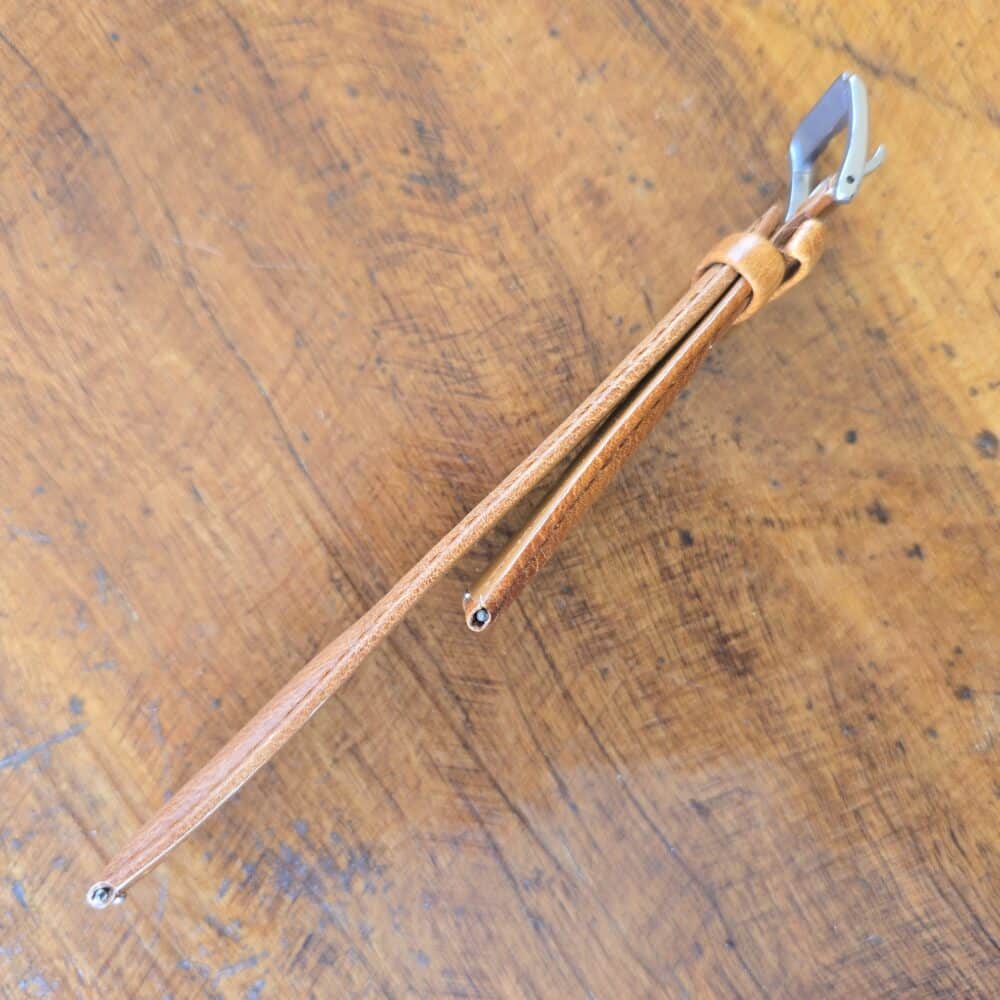 leather watch band on side showing thickness of both pieces